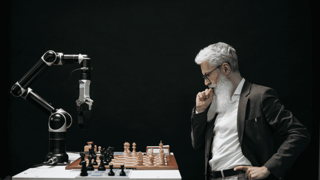 Empresario jugando ajedrez con un brazo robótico que simboliza la inteligencia artificial en el entorno de Kit Consulting.